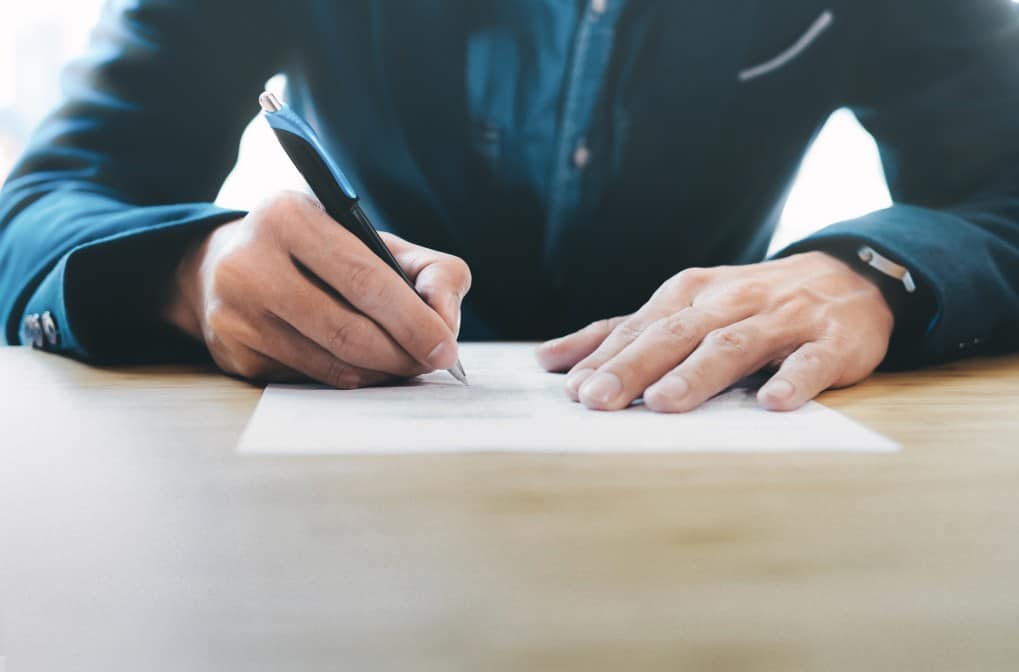 Lawyer filling out paperwork